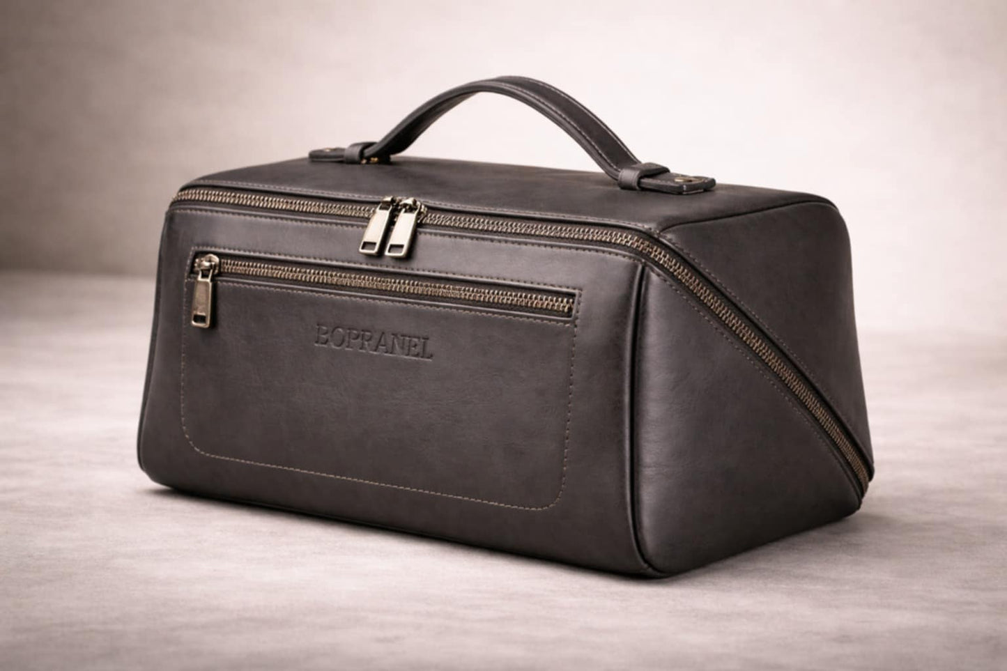 L’INTERVALLE Trousse de voyage en cuir café